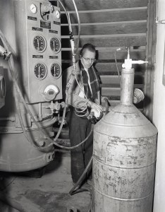 Man with liquefier equipment