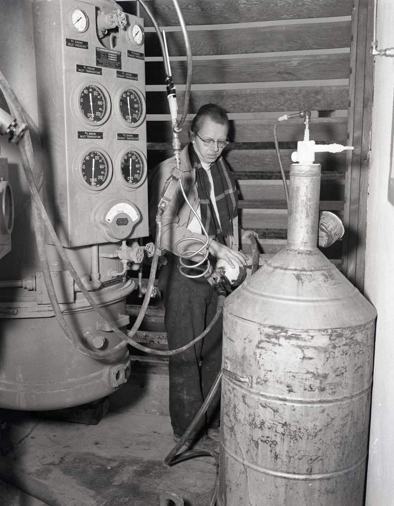 Man with liquefier equipment