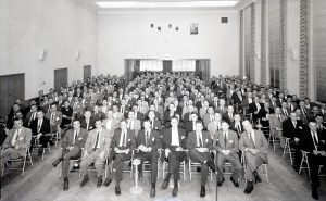 Group seated in auditorium.