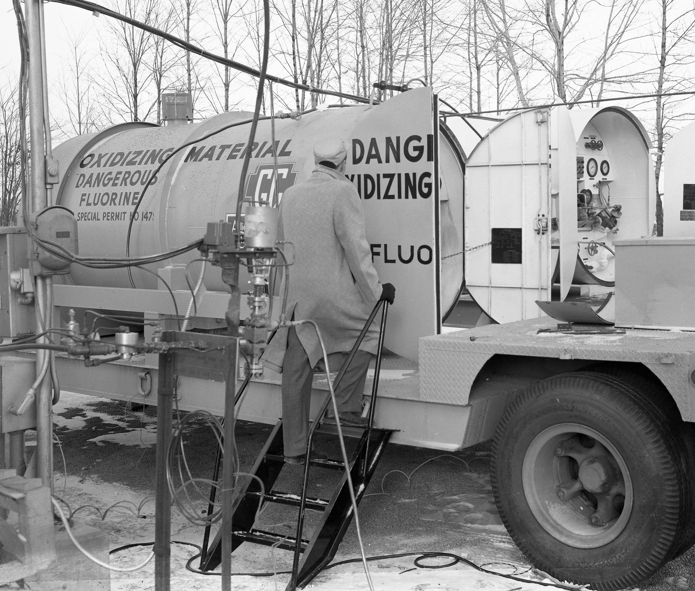 Man with tanker trailer.