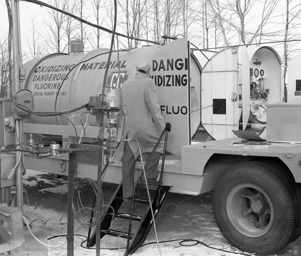 Man with tanker trailer.
