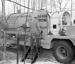 Man with tanker trailer.