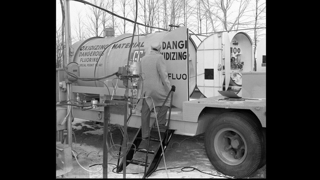 Man with tanker trailer.