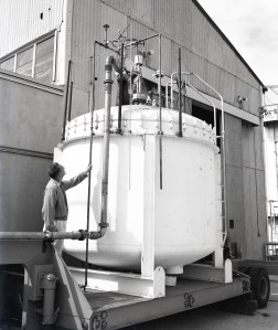 Man looking at tank