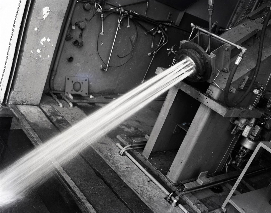 Water flowing through nozzle.