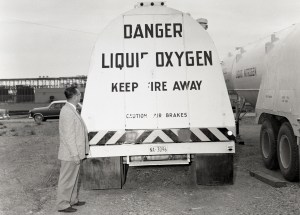 Man looking at back of tanker.