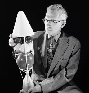 Man holding rocket model.