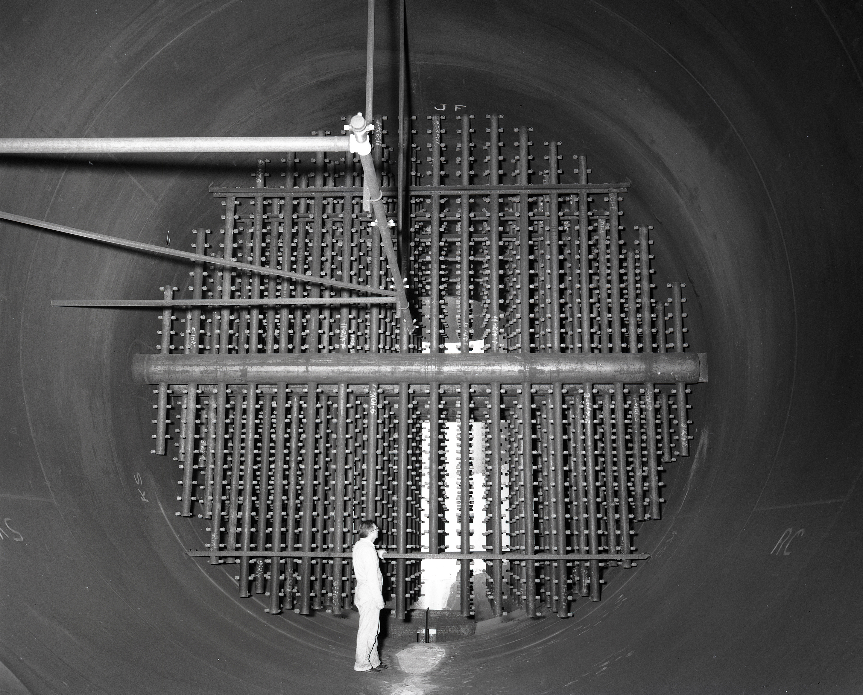Man looking at spray bars in scrubber