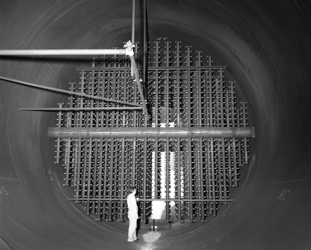 Man looking at spray bars in scrubber