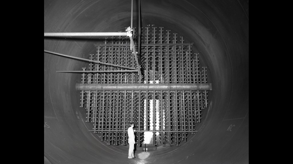 Man looking at spray bars in scrubber