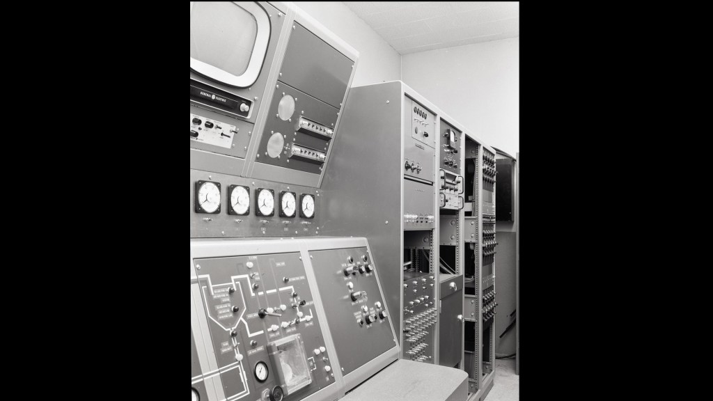 Control panels in control room.
