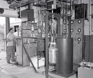 Men with equipment in Cell 21.