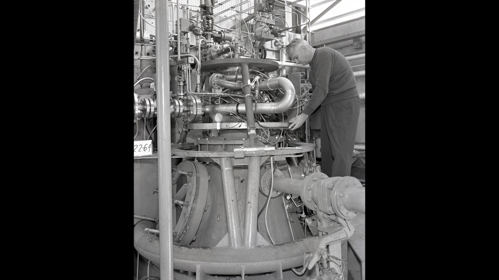 Mechanic working on RETF test stand.