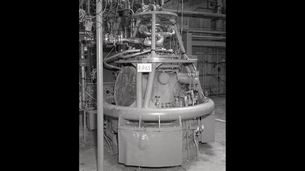 Man working on RETF test stand