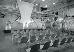 Chairs in front of exhibit.