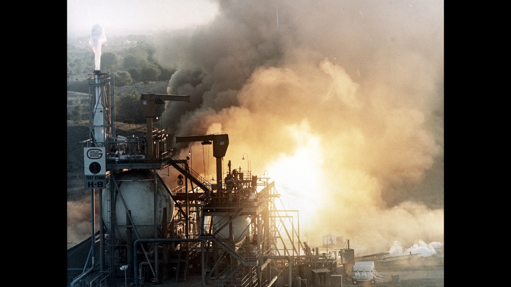 Fiery engine test at outdoor facility.