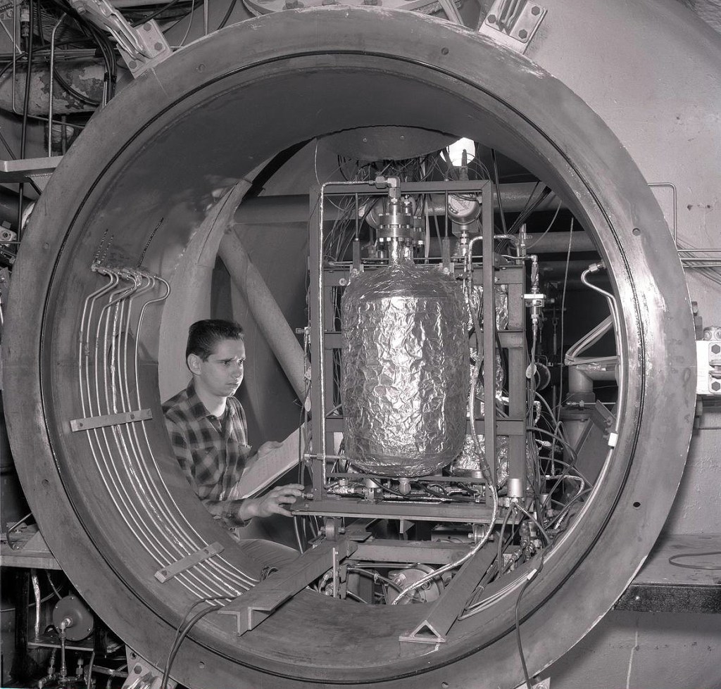 Man with equipment in test cell.