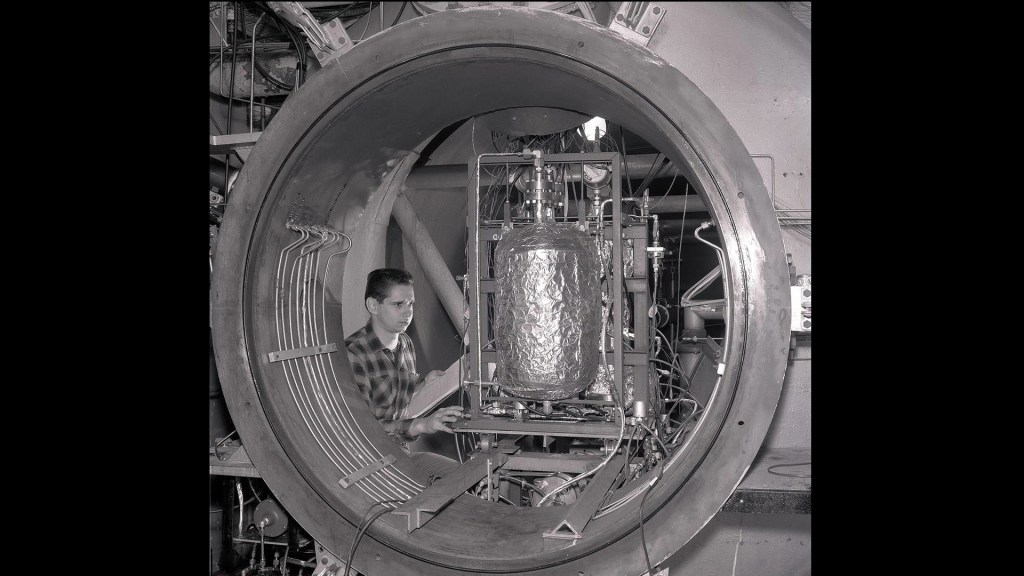 Man with equipment in test cell.
