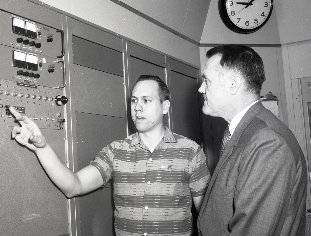 Eitzler points to control panel