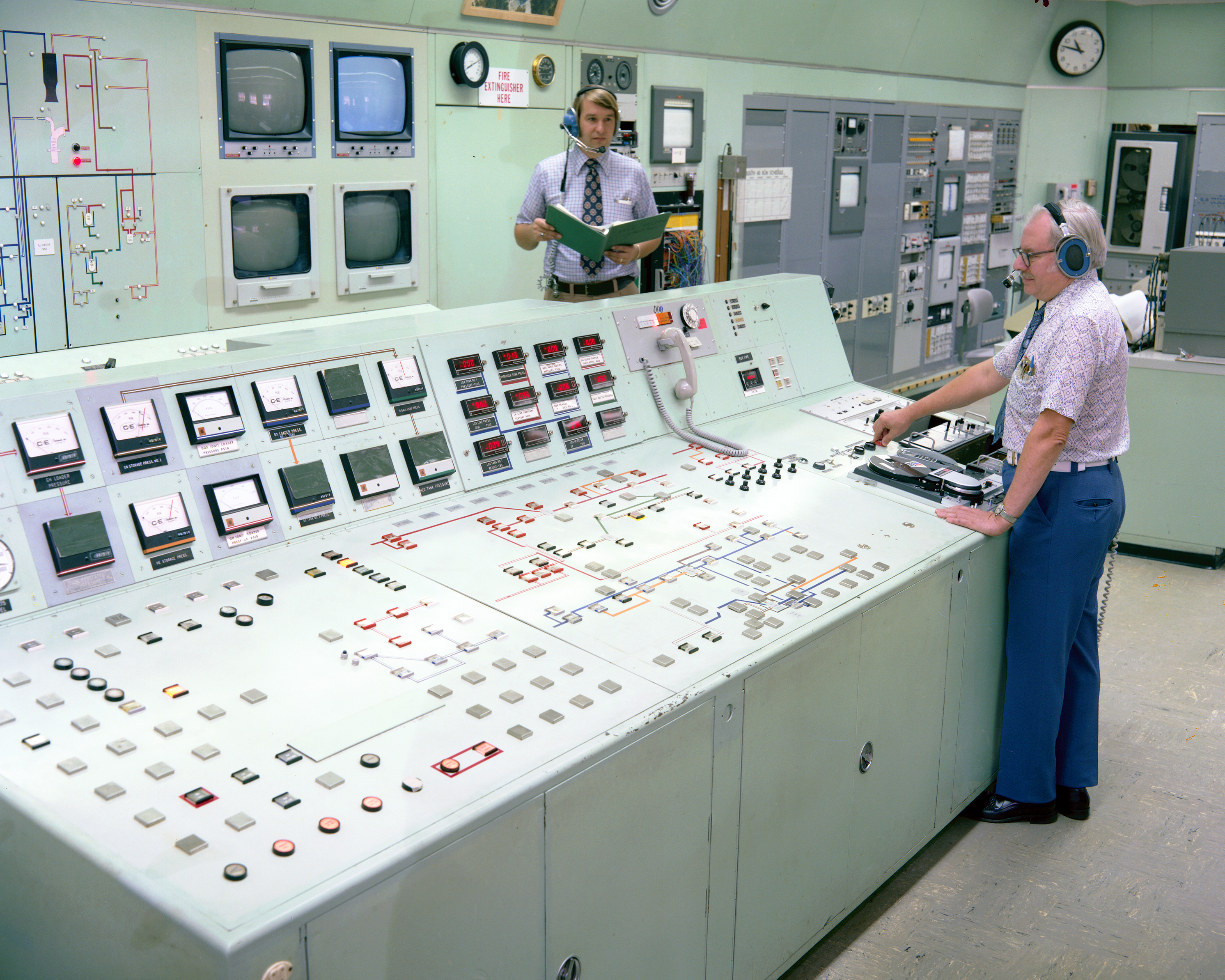 Two operators in control room