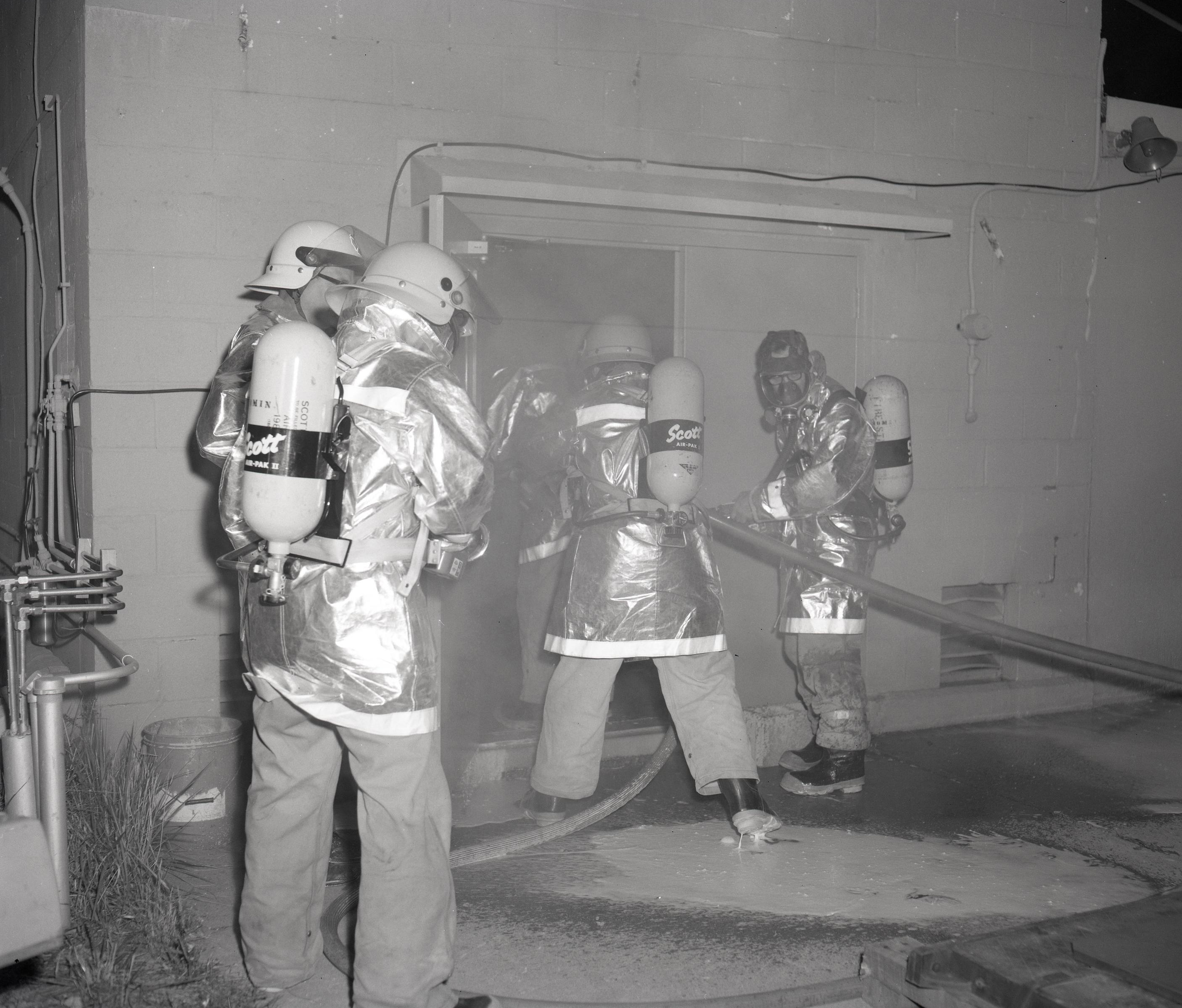 Firecrew in smoky room.