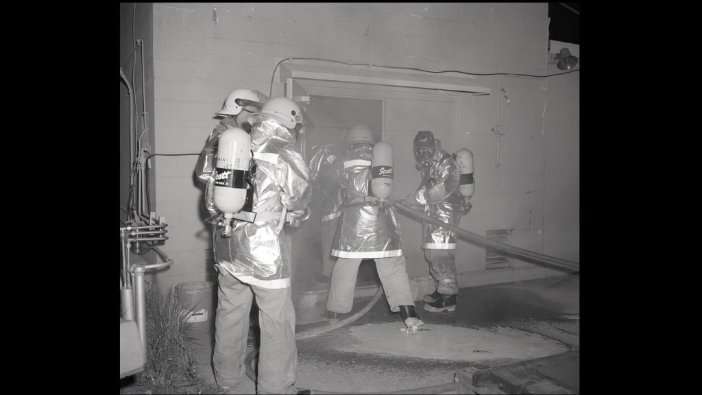 Firecrew in smoky room.
