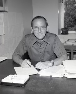 Man sitting at desk.