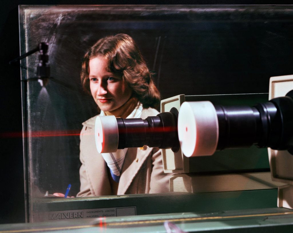 Woman watching small thruster.