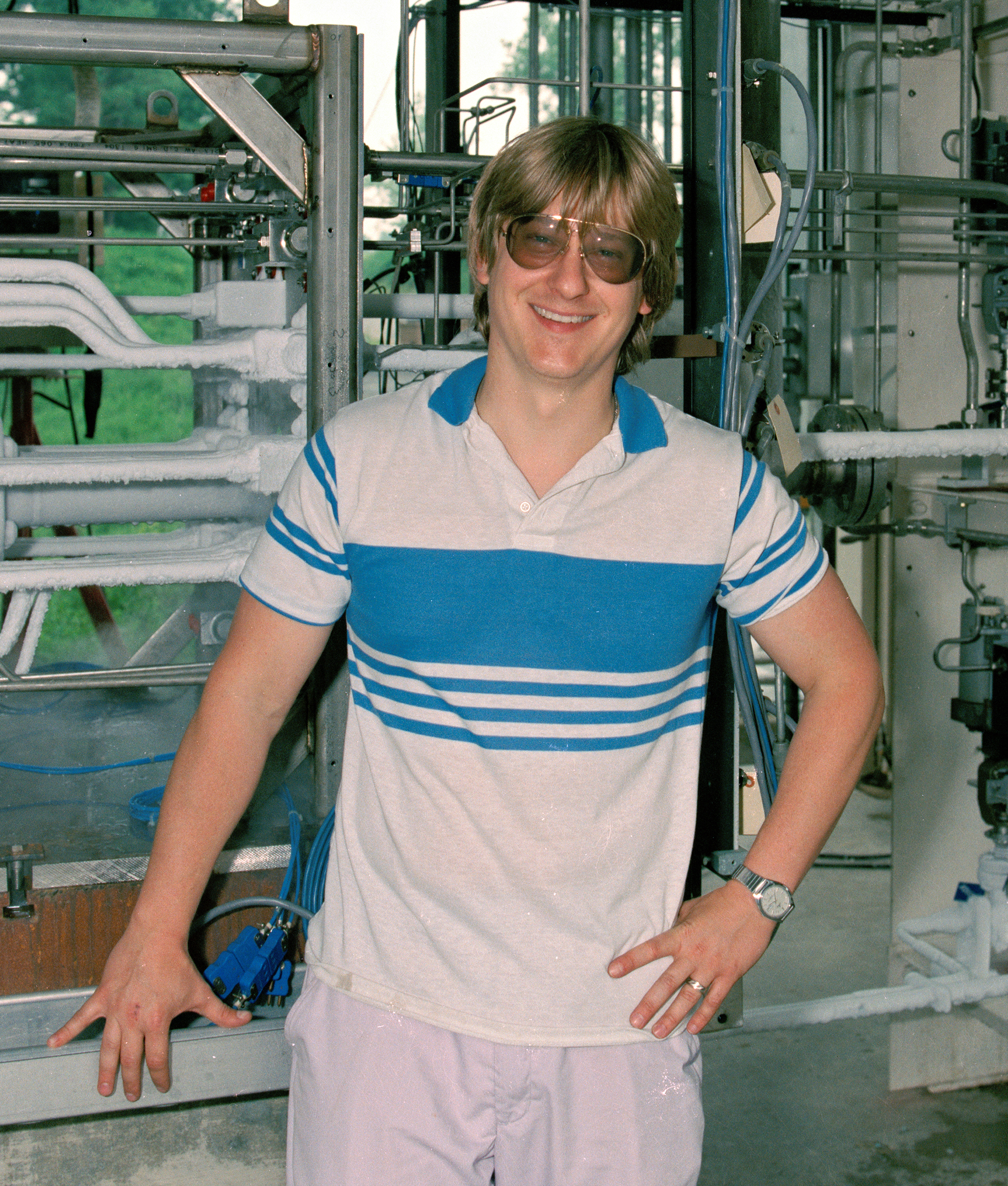 Man standing in front of equipment.