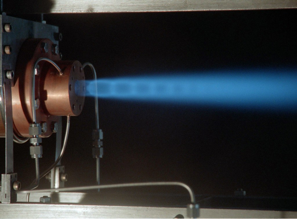 Thruster firing horizontally.