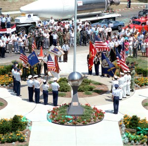 Group gathered around flagpole.