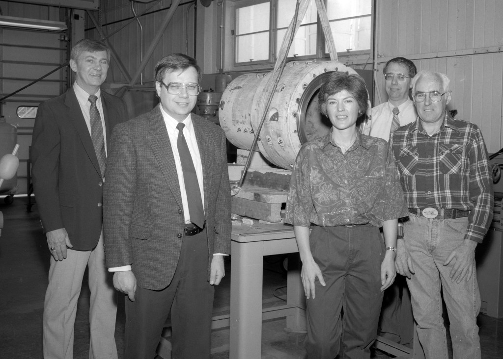 Five people with engine.