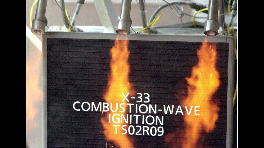 Two flame thrusters firing downward.