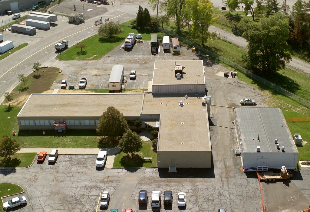 Aerial view of small buildings.