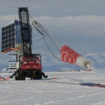 A payload attached to a launch vehicle is being prepared for launch in a Antarctica.