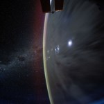 The Milky Way appears beyond Earth's horizon in this celestial photograph captured by NASA astronaut Don Pettit using a camera with low light and long duration settings as the International Space Station orbited 259 miles above the Coral Sea off the coast of Queensland, Australia.