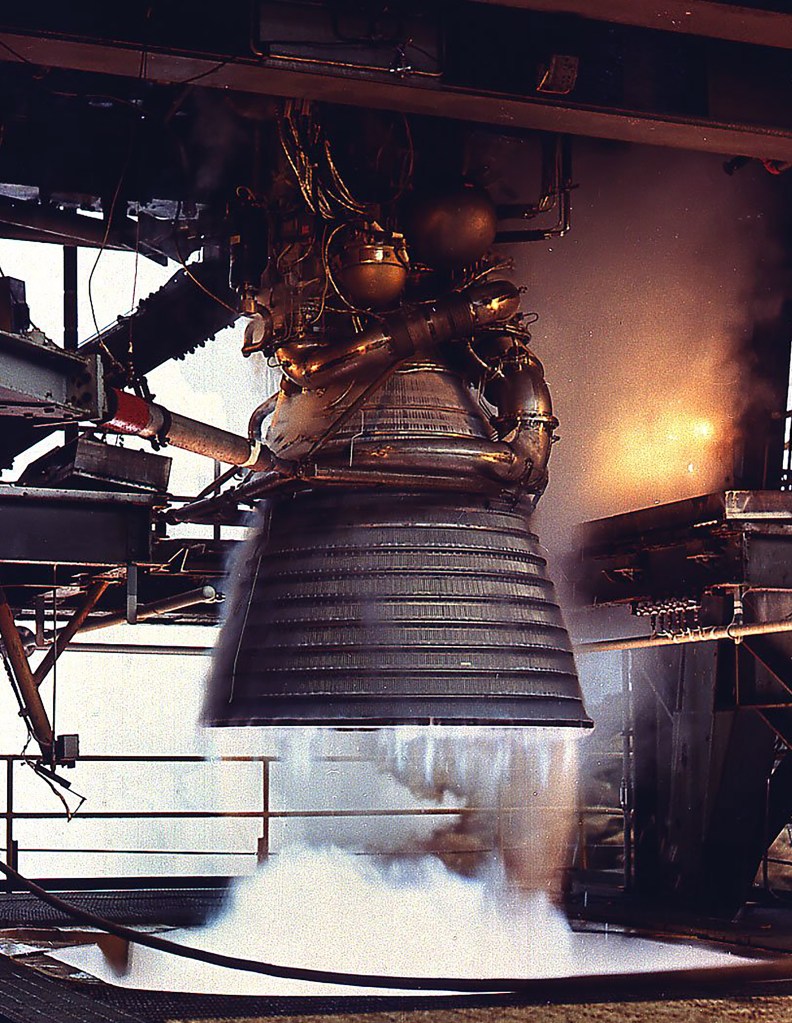 J-2 firing downward in test stand.