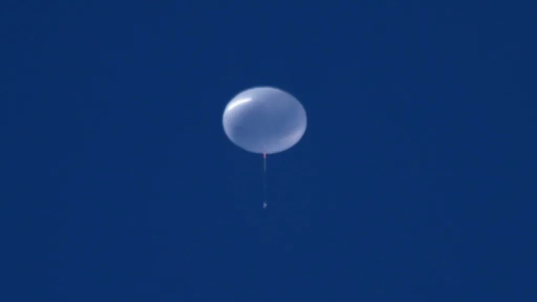 A fully inflated balloon ascending into sub-orbit.