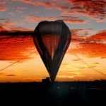 Inflated balloon at sunset.