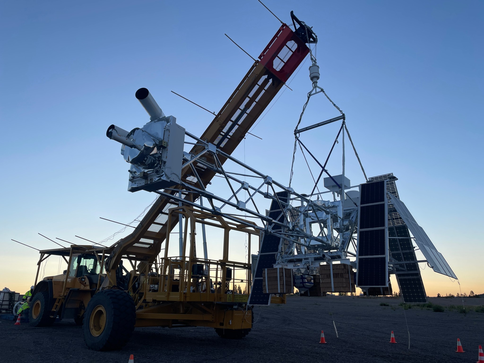 Payload on a launch vehicle at sunrise.
