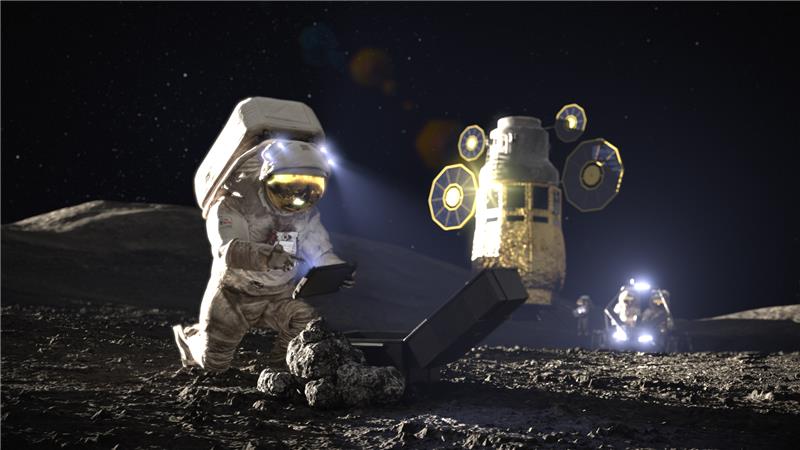An astronaut looks down at a screen while kneeling on the moon's surface. A ship and a small vehicle sit behind him.