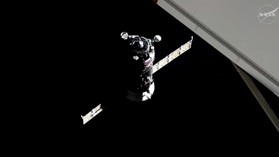 The Progress 92 cargo craft approaches the International Space Station for an automated docking to the Poisk module.
