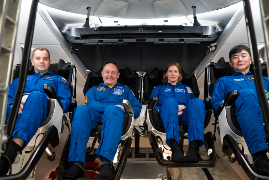 The four crew members of NASA's SpaceX Crew-11 mission to the International Space Station train inside a SpaceX Dragon spacecraft in Hawthorne, California. From left to right: Roscosmos cosmonaut Oleg Platonov, NASA astronauts Mike Fincke and Zena Cardman, and JAXA astronaut Kimiya Yui.