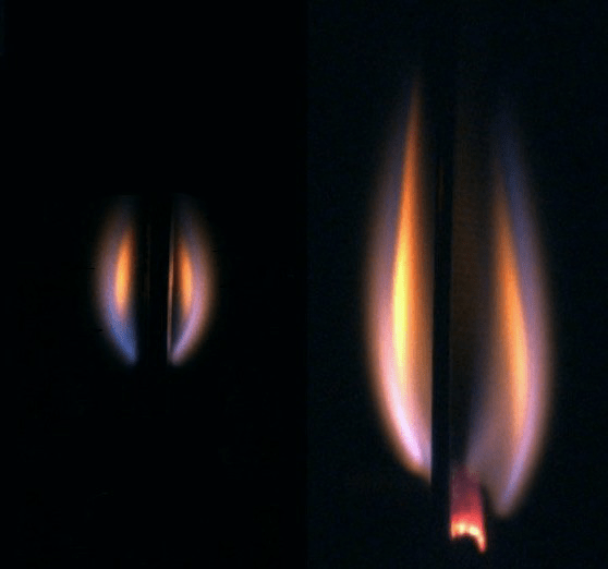 Edge view of Solid Inflammability Boundary at Low-Speed (SIBAL) fabric, a cotton-fiberglass blend, burning in air in lunar gravity (simulated in drop tower centrifuge).