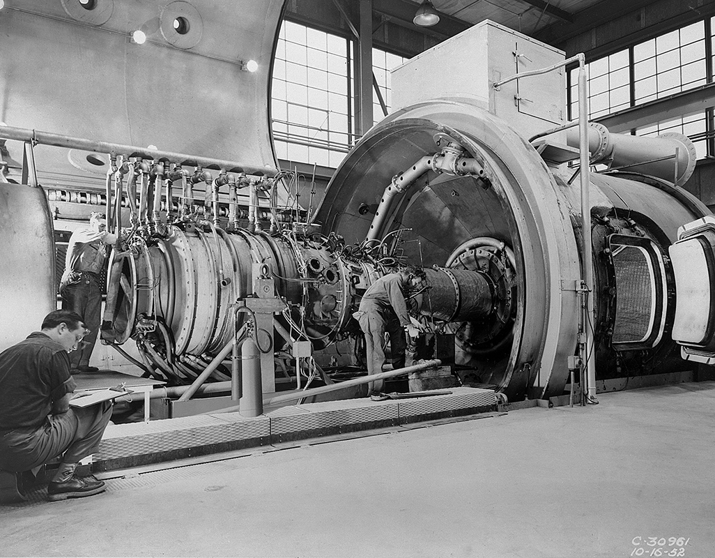 Large engine installed in test chamber.