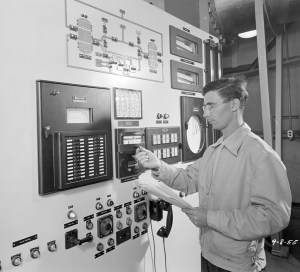 Man looking at control panel.