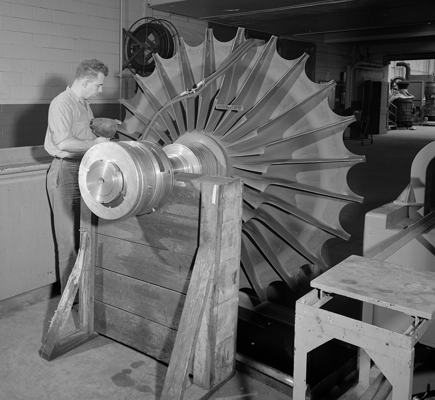 Man working on equipment.