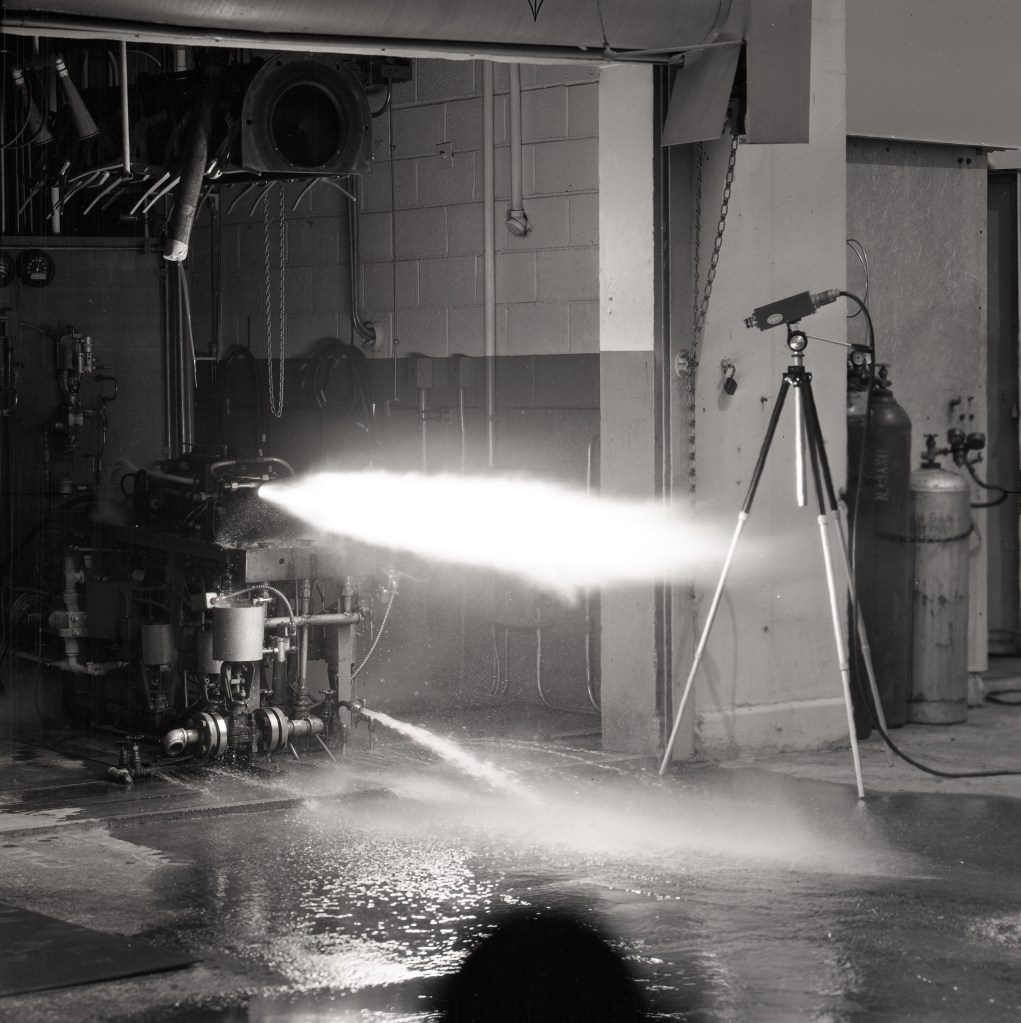 Camera filming horizontal firing of engine.