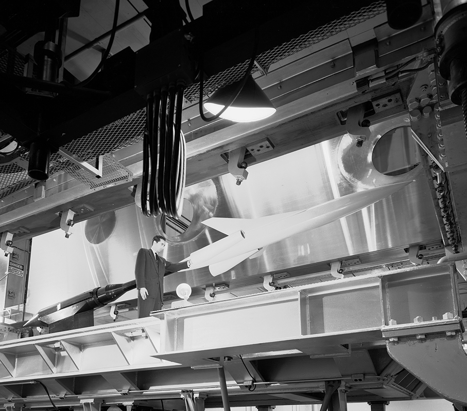 Man with test article in test section.