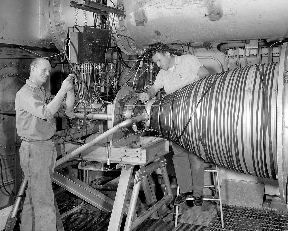 Mechanic working on engine